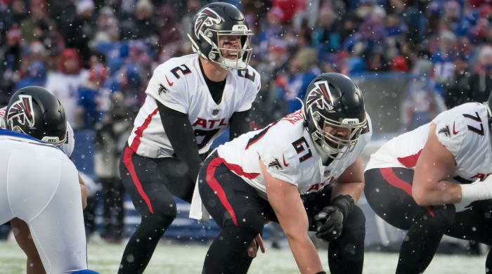 Atlanta Falcons quarterback Matt Ryan (2) and center Matt Hennessy (61) at the line of scrimmage in the fourth quarter against the Buffalo Bills at Highmark Stadium.